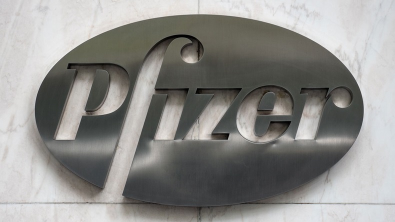 NEW YORK CITY - MAY 2015: Metal plate logo of Pfizer in his headquarters building. Pfizer is an American multinational pharmaceutical corporation, one of the world's largest pharmaceutical companies.