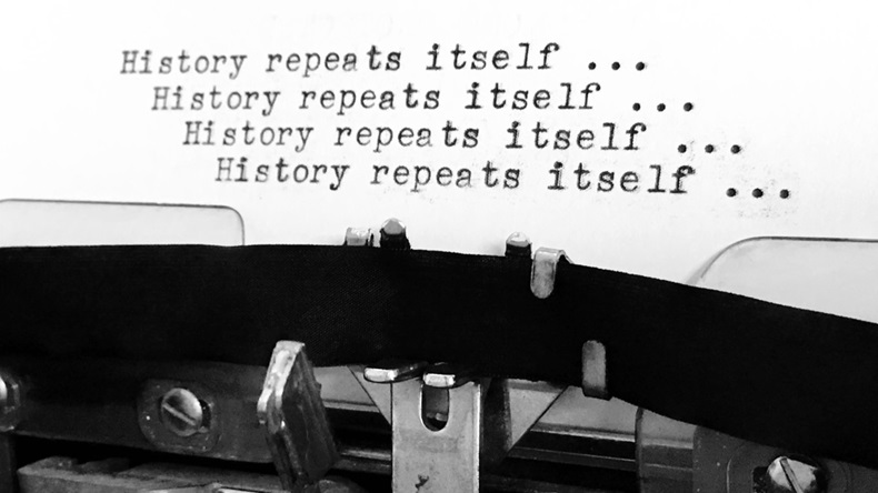 Typewriter with typed lines "History Repeats Itself..."