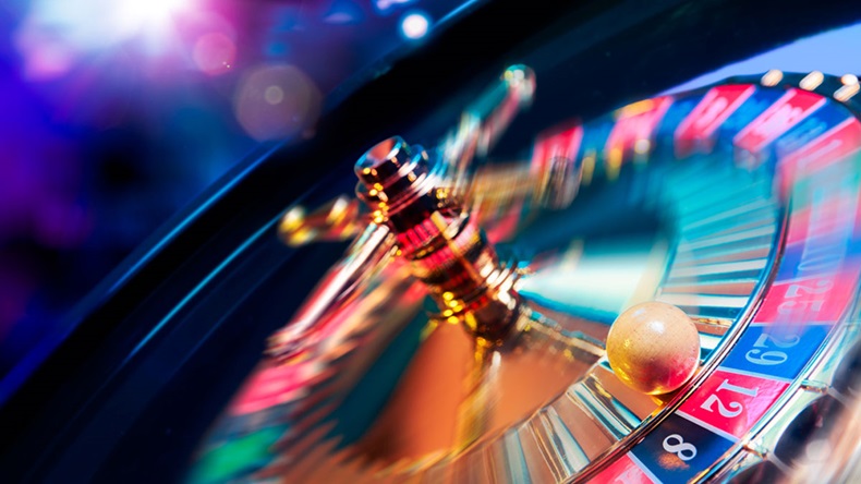 high contrast image of casino roulette in motion - Image 