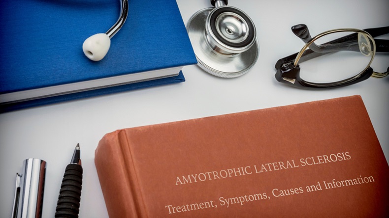 Titled book Amyotrophic Lateral Sclerosis along with medical equipment, conceptual image - Image 