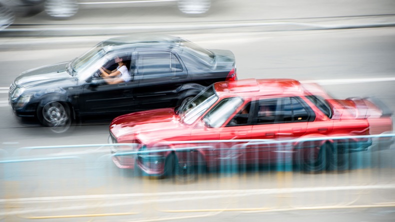 street cars racing in blurred action