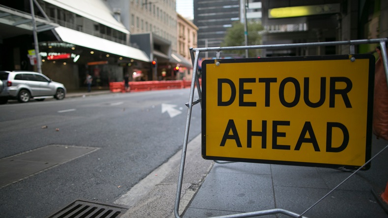 Detour warning sign on the pedestrians footpath surface in Sydney city CBD, Australia - Image 