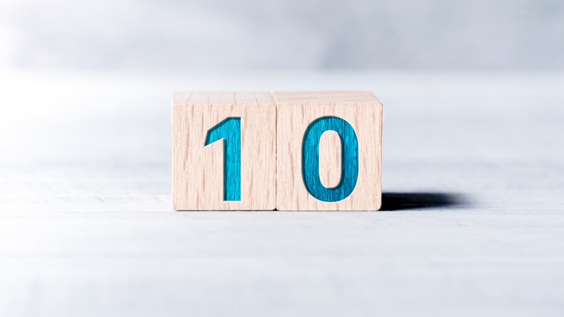 Number 10 Formed By Wooden Blocks On A White Table