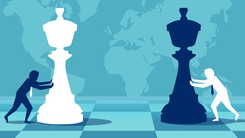 businessmen moving chess pieces on board of worldwide politics