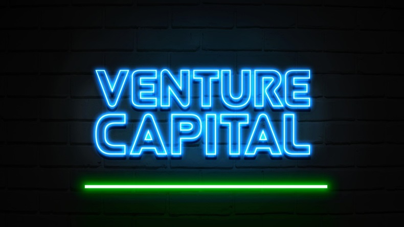 Blue and green "venture capital" neon light