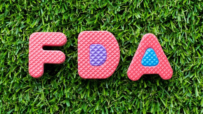 FDA Spelt Out In Letters On Grass Background