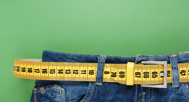 Jeans with a tape measure as a belt