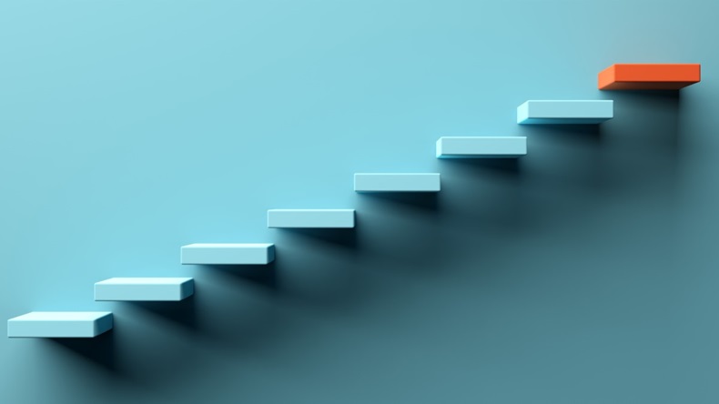 graphic of blue steps going up, blue background
