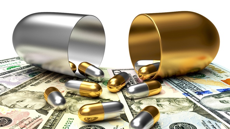 silver and gold pills spilling onto dollar bills