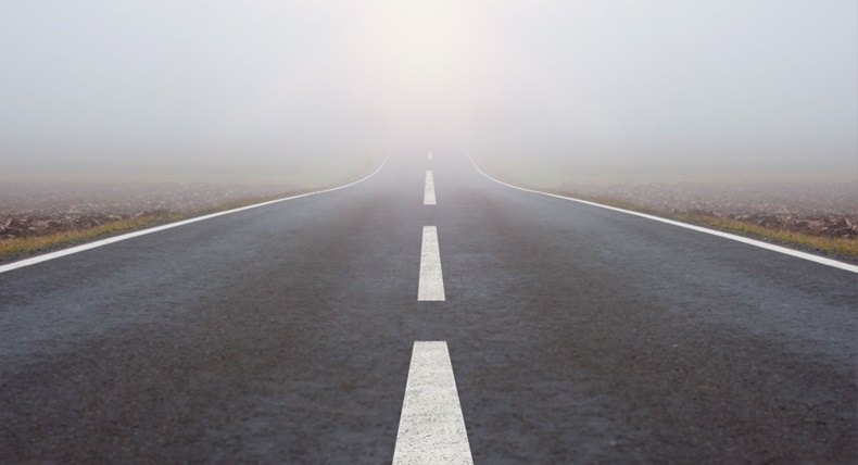 Mist at the potential end of a road