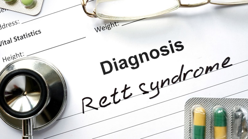 Diagnosis Rett syndrome, pills and stethoscope.